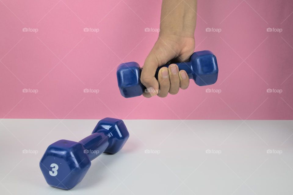 Weights to exercise the arms. Exercises in the gym