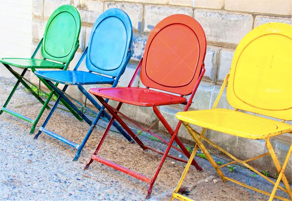 Colorful chairs in a row