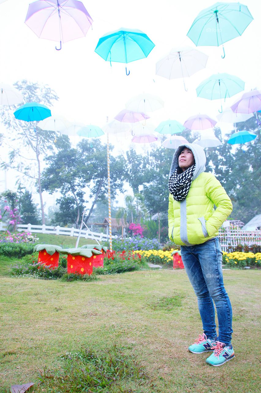 Beautiful garden.. A woman is happy in beauty garden at Pai Maehongson Thailand.