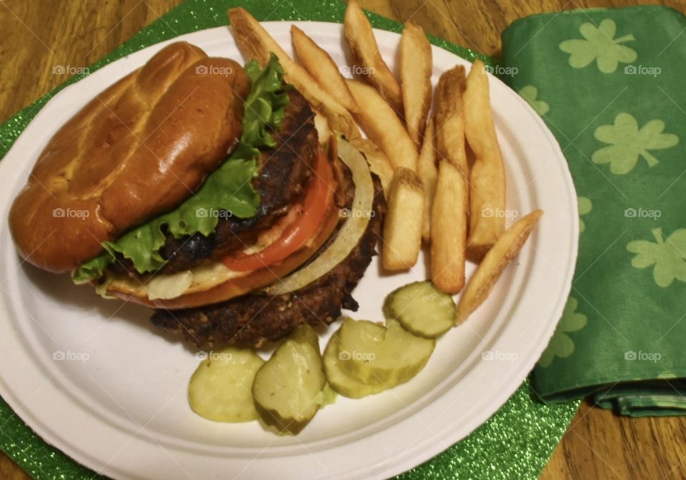 My favorite sandwich burger with lettuce pickles and tomatoes 