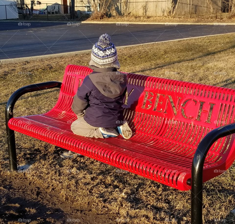 boy on a bench