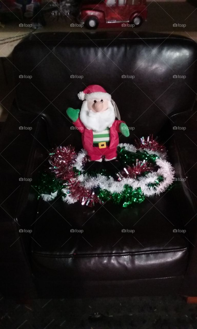 Santa in a chair.