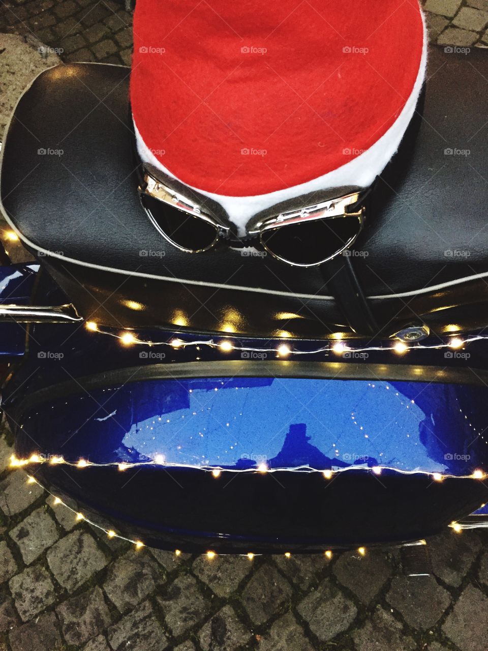 Santa Claus hat and glasses on vespa