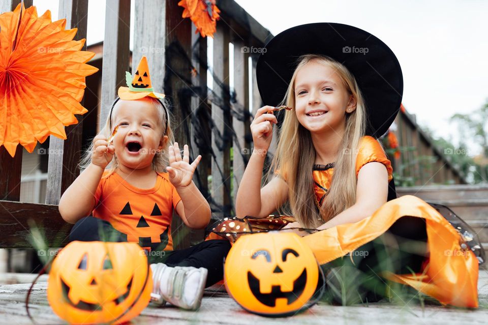 Kids celebrating Halloween outdoor 