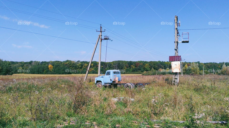 old broken truck in the field