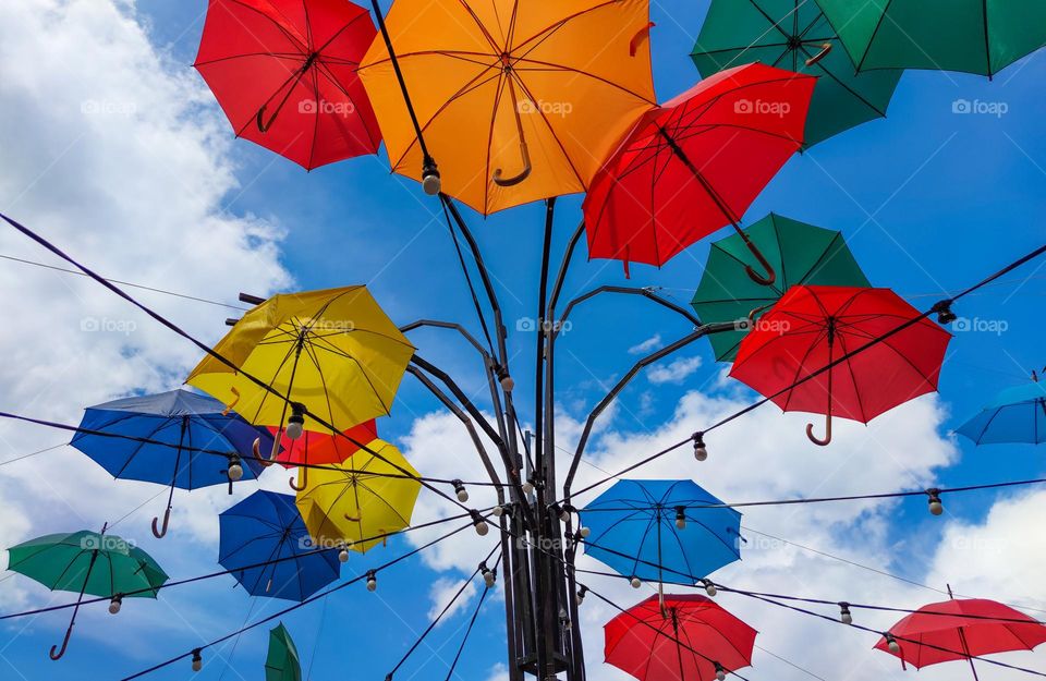 Colorful umbrellas in the sky