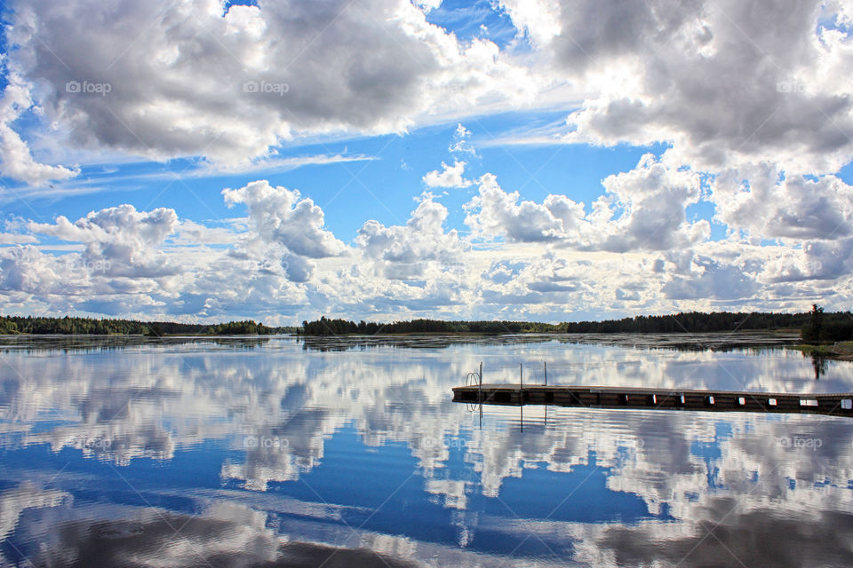 Amazing clouds reflection on water