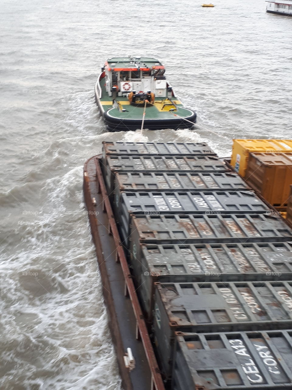 A Tug Pulling Barges