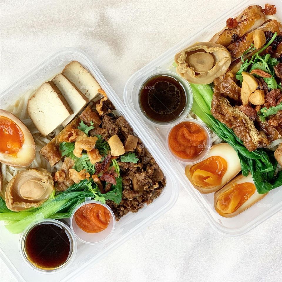 Chargrilled chicken and stewed pork al dente noodles with ramen egg and baby abalone 