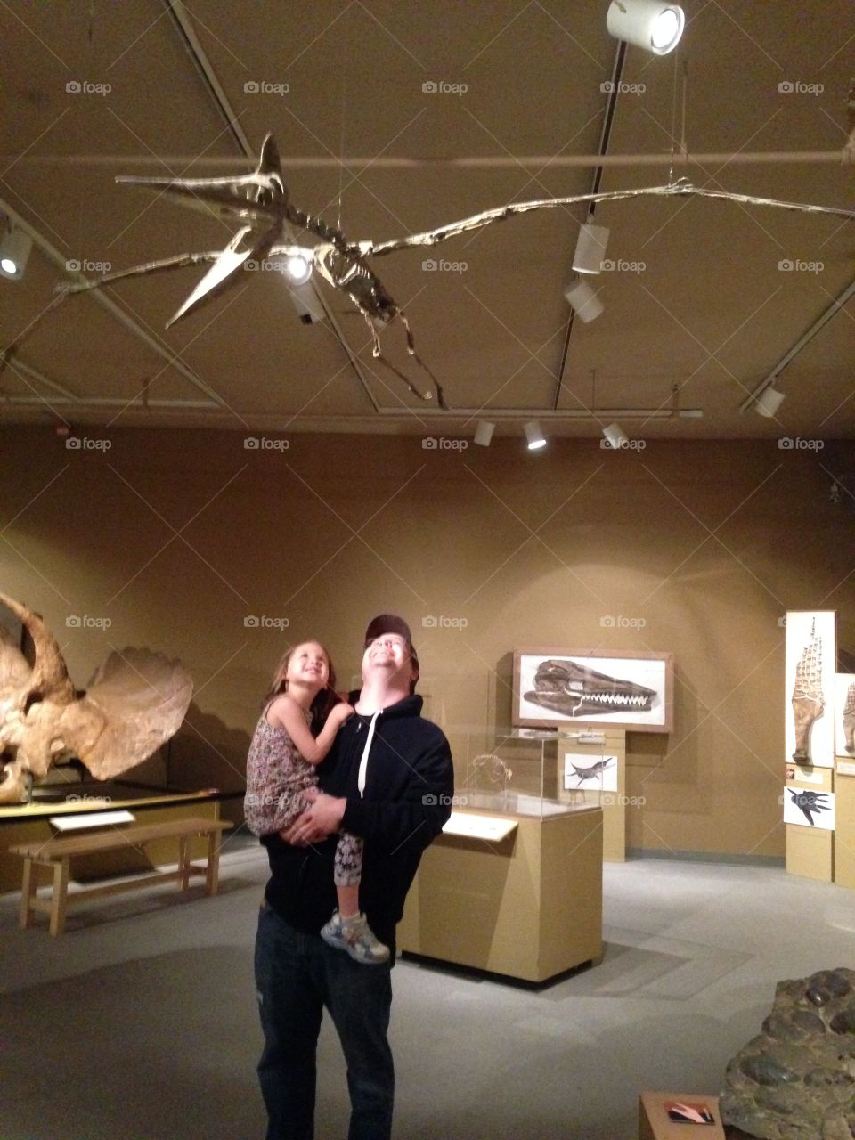 Father and daughter and love a of dinosaurs 