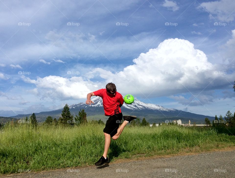 Soccer by the mountain