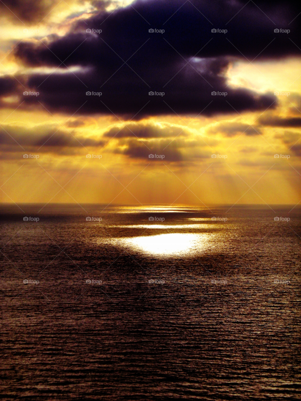 Stormy sky over an ocean during sunset