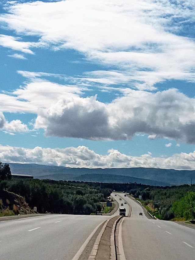 On the road whit cloudy sky
