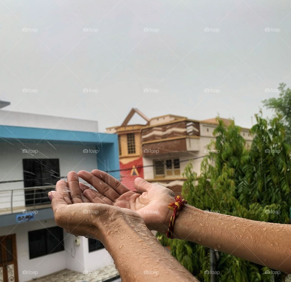 Feel the rain...monsoon fun
water droplets on human hand that magic touch.