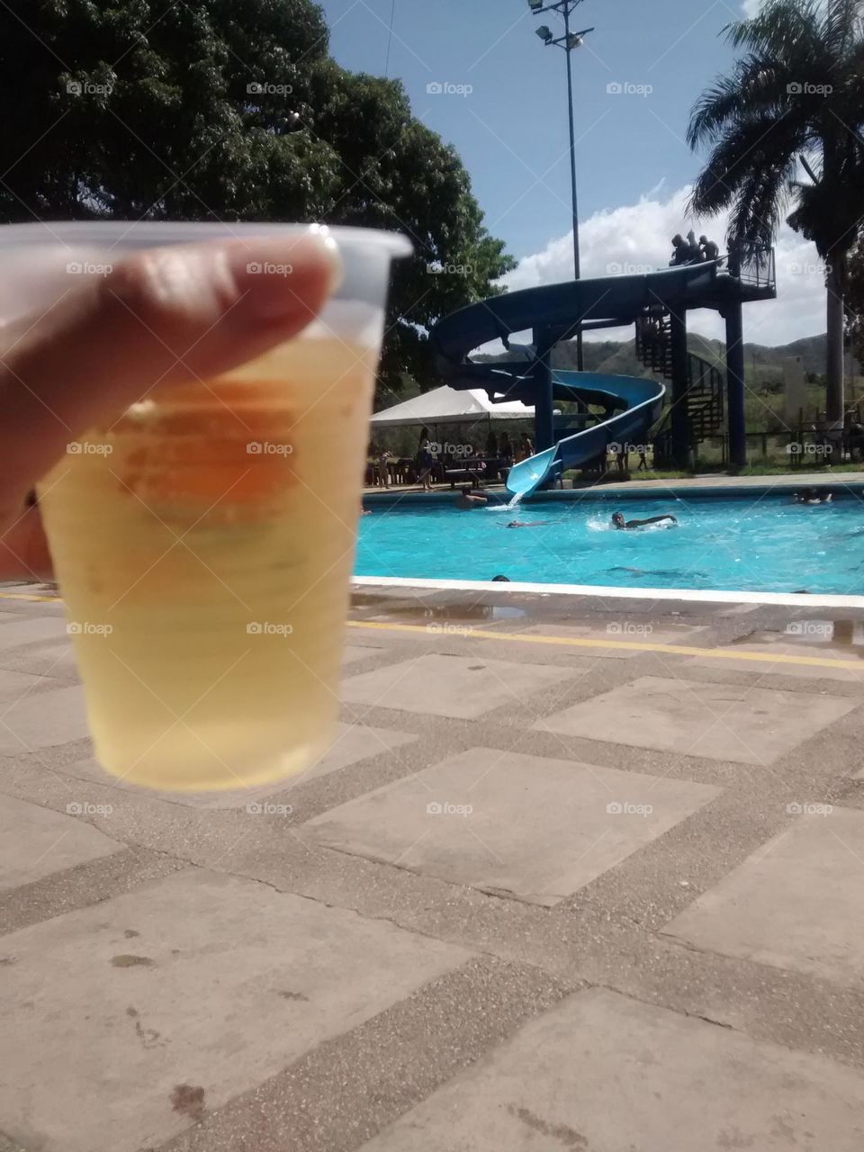 refreshing the afternoon in the blue water of the pool