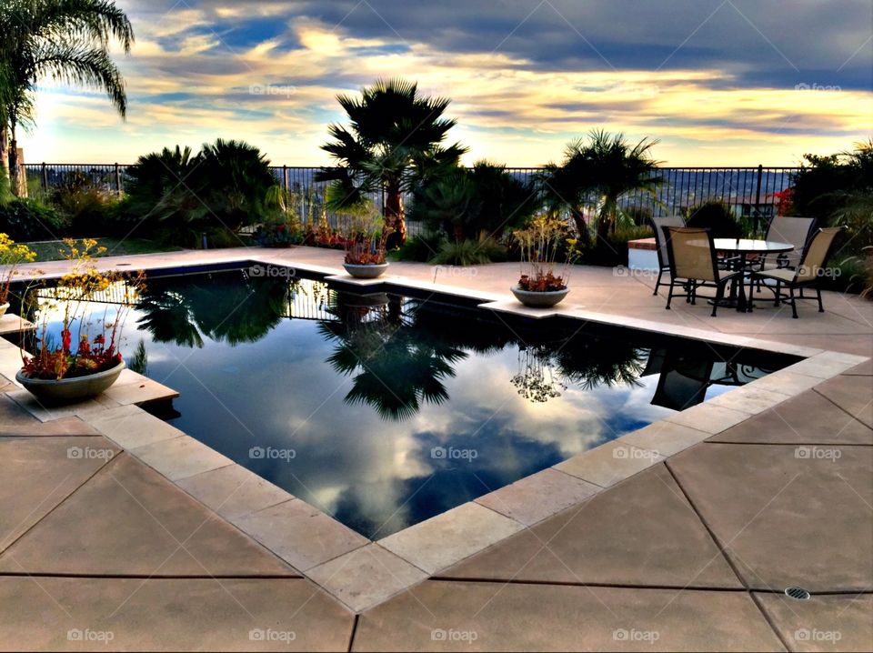 Swimming Pool at Sunset . Luxury backyard pool at sunset 