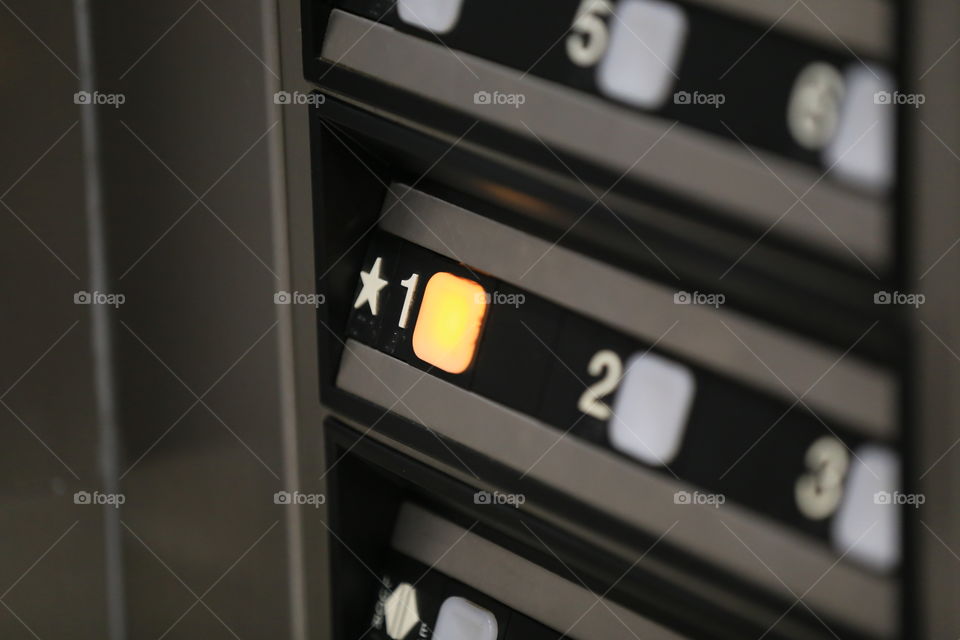 Take me to first floor please. Focused on everyday buttons around us from an angle we are used to seeing. This one is from a hospital  elevator. 