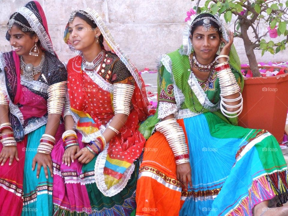 Women. Women in colorful dresses on the set of the Bollywood movie. Udajpur. India