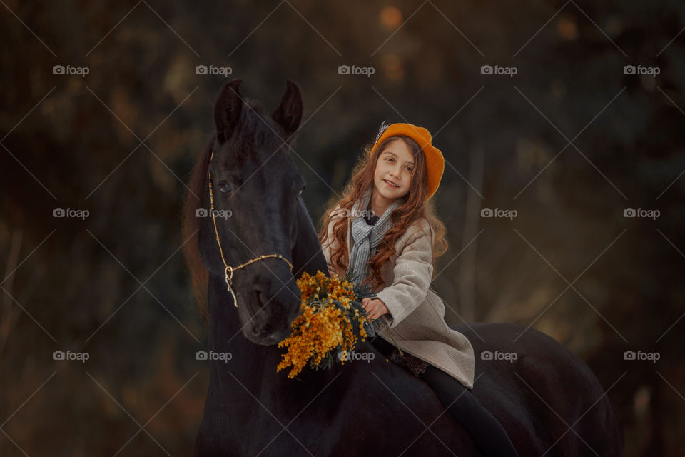 Little girl with horse 