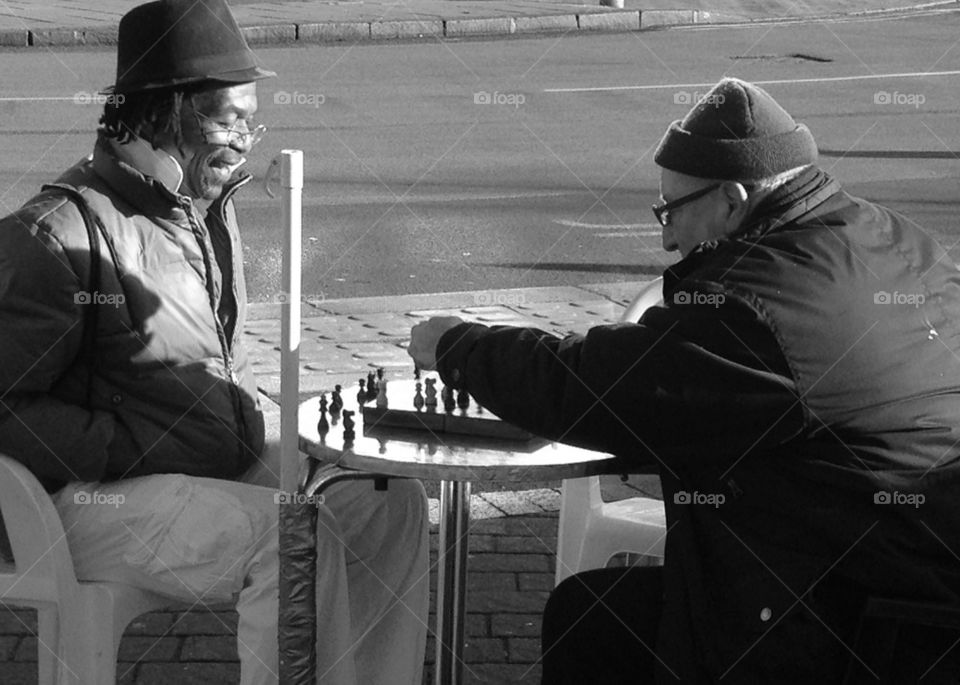 chess black and white cafe laughter by jimfilum