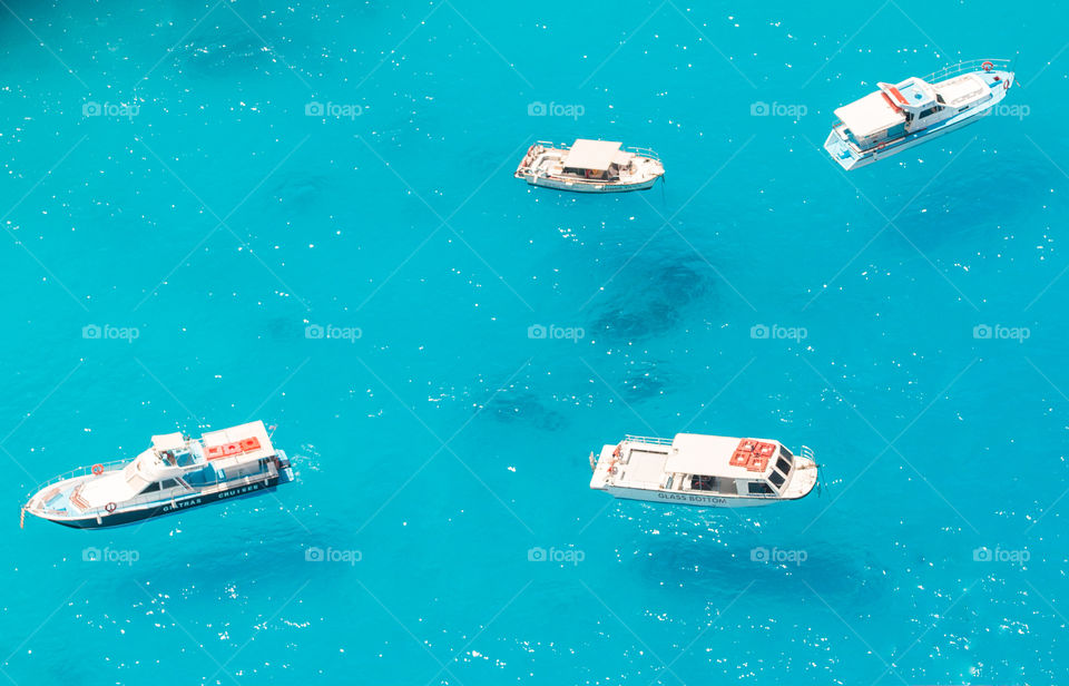 Boats On Turquoise Blue Sea
