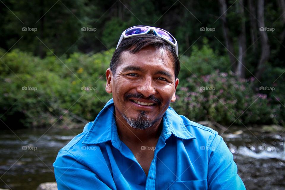 Father smiling on a hike