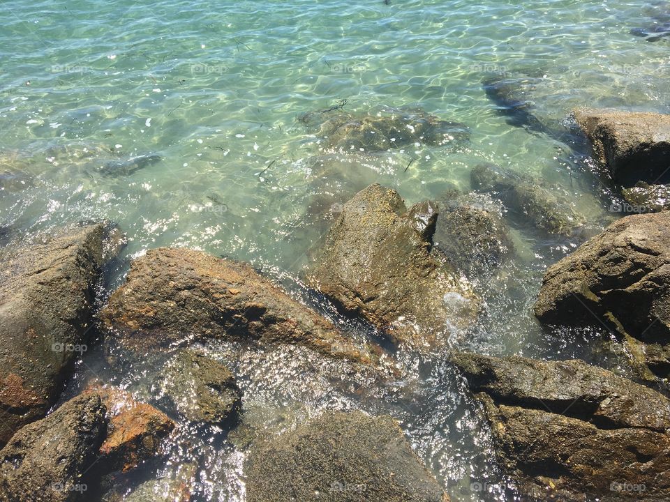 Clear waters with rocks 