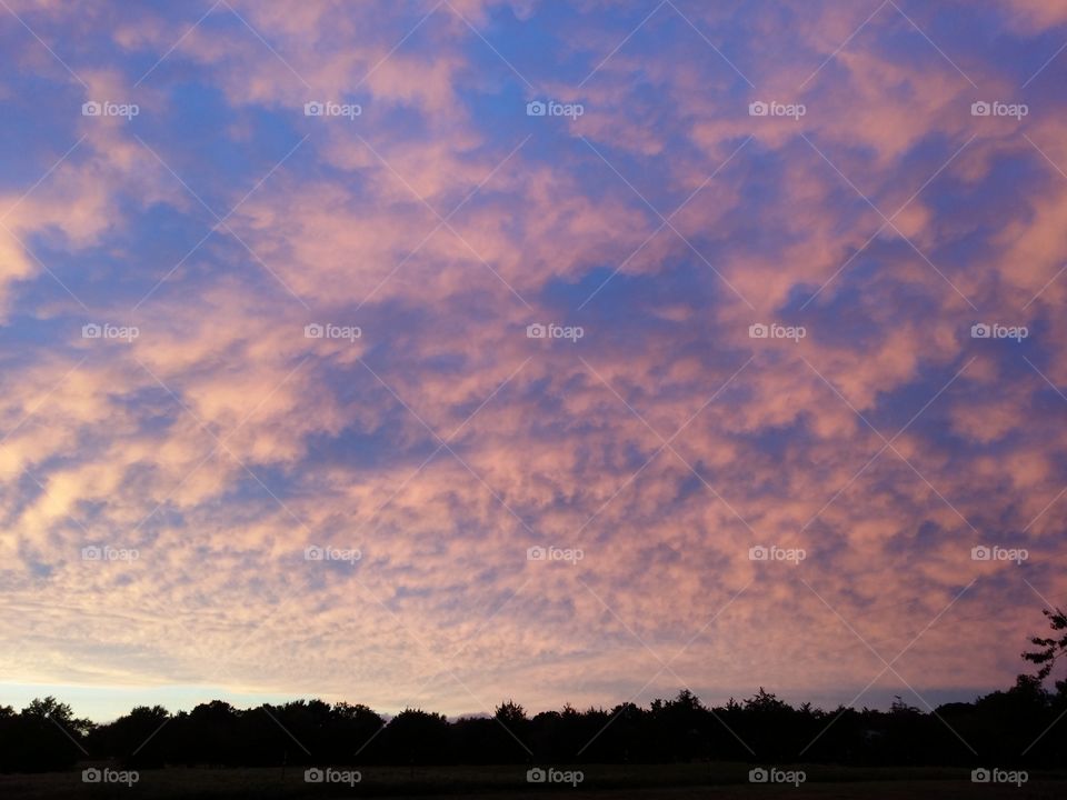 Pink purple and blue sky full of clouds