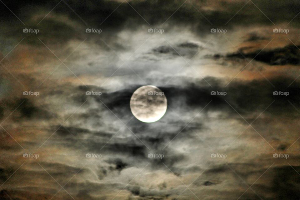 Full Moon through clouds