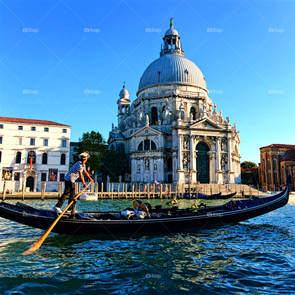 Summer  sunset on a gondola on the Grand Canal, Venice, Italy