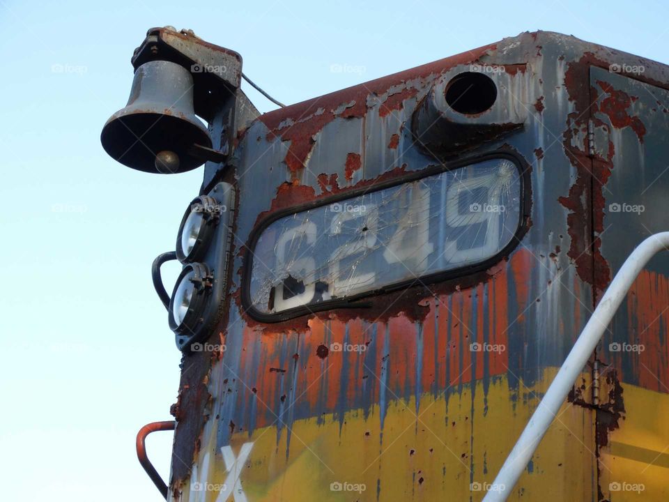 old abandoned rusty broken train locomotive lights bell