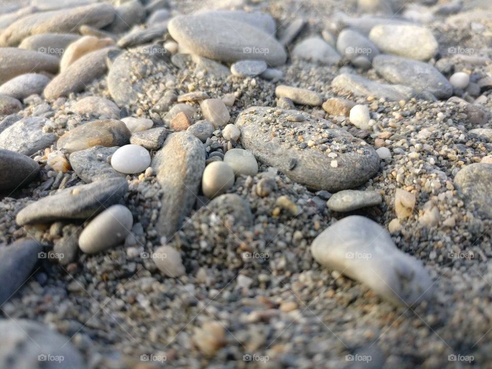 Pebbles on sand