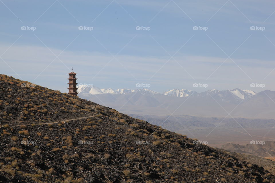 Lonely tower in the mountains 