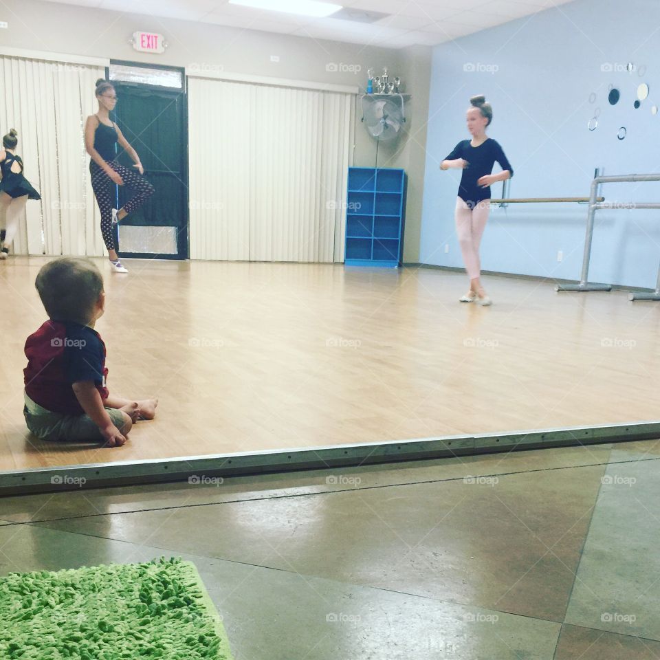 My son watching the girls take ballet