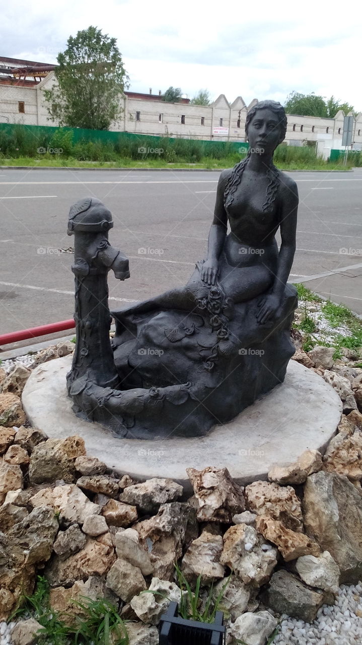 The statue of the female-plumber. Samara, Russia