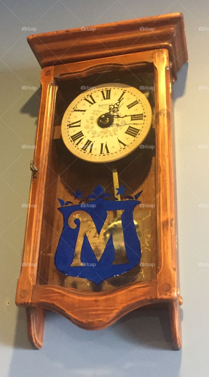 Wooden Pendulum clock with a M monogram