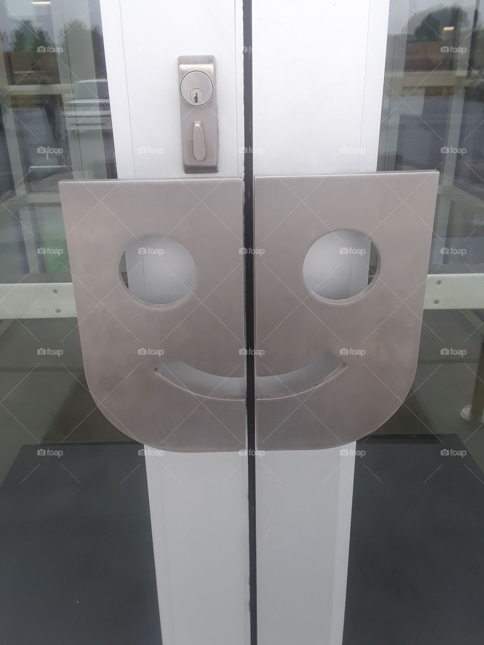 Smiling Door Handles Entrance