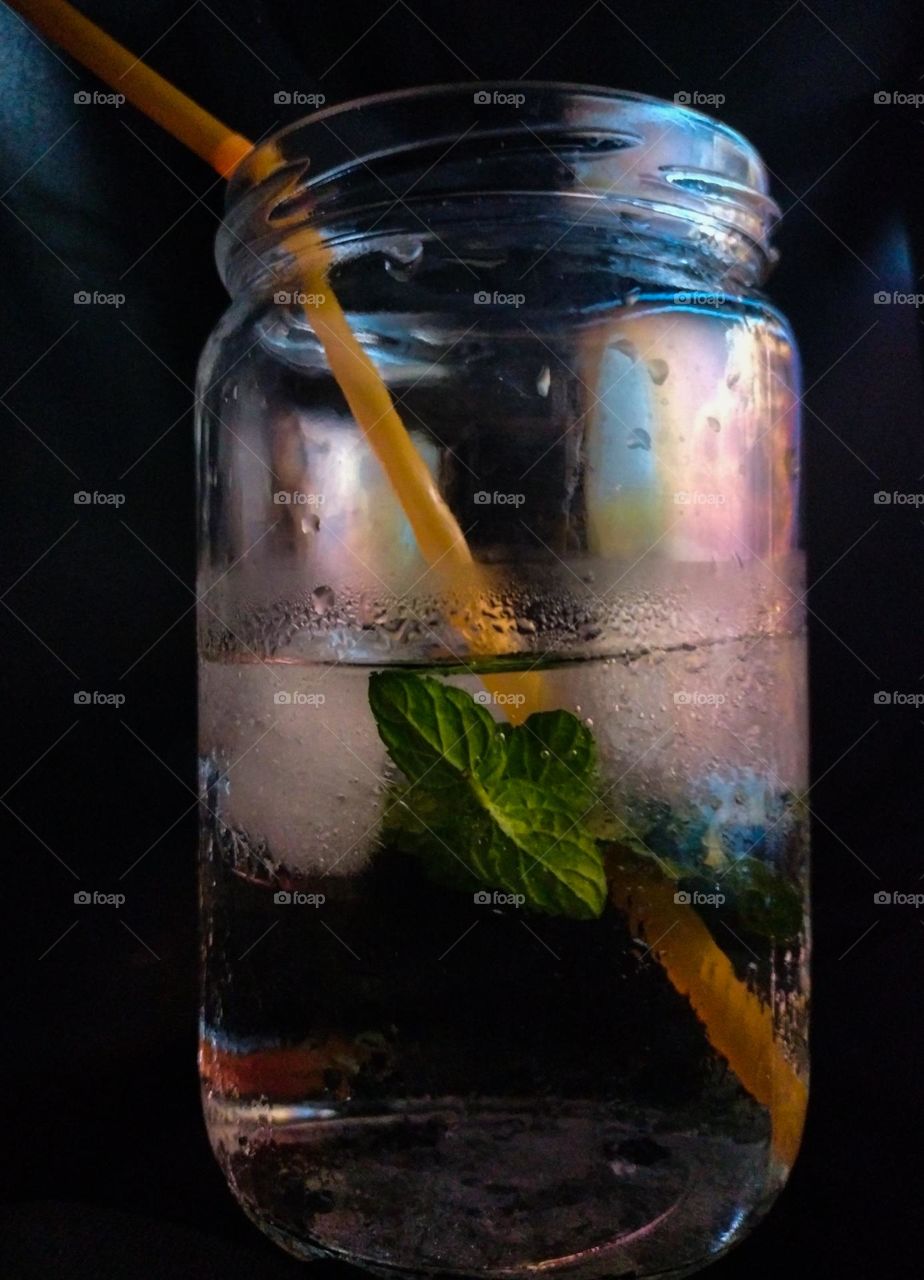 ice in water with green mint