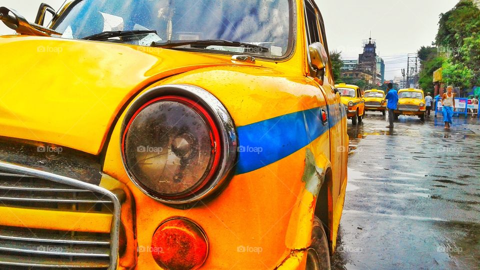 "Yellow" 
Beautiful it is to travel until you come home and rest your head on your old, familiar pillow. What if you find your home where ever you travel? Kolkata Cabs promises to make its customers feel at home.
Place : kolkata, India.