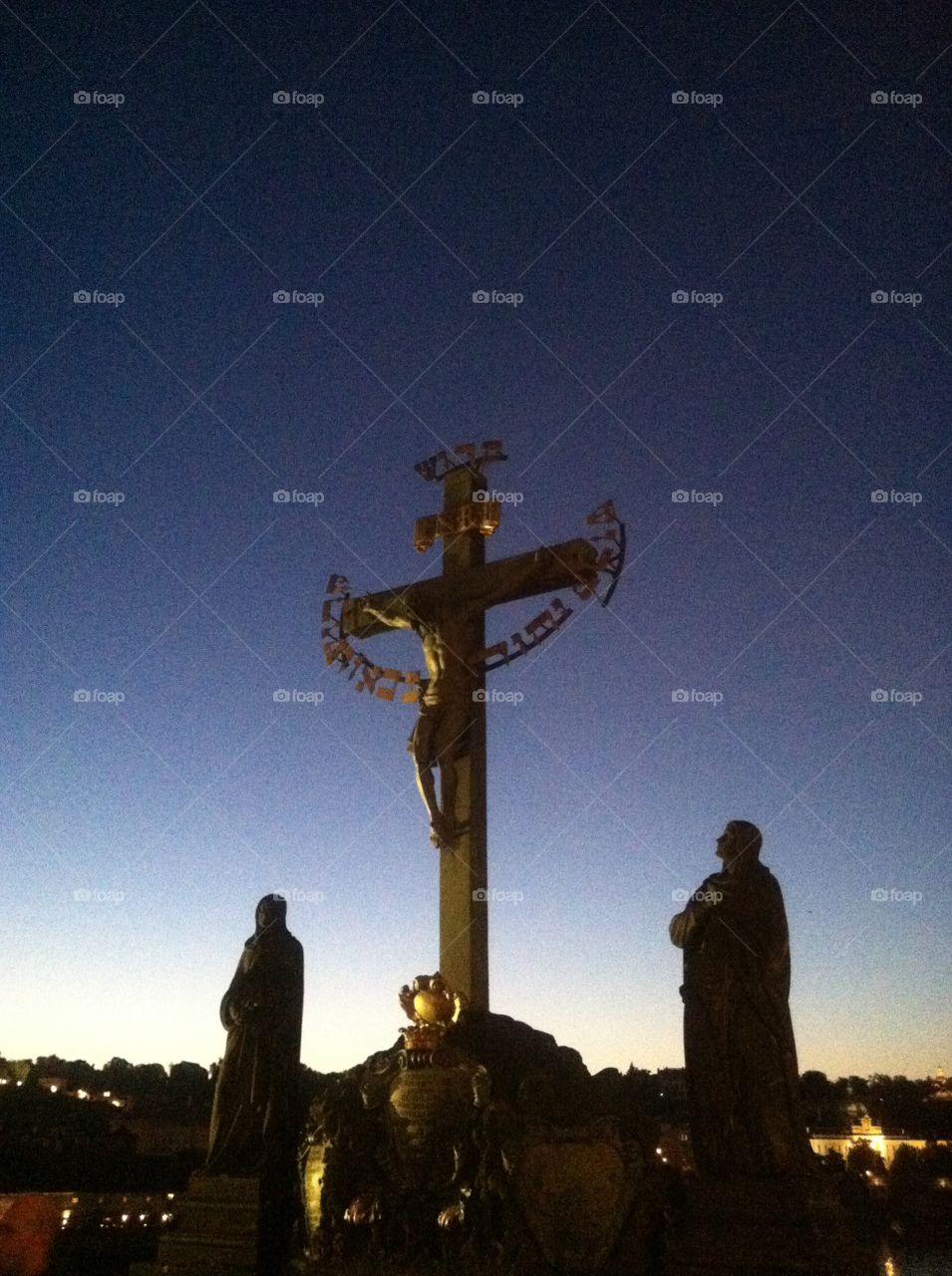 Religion on a bridge . Prague St Charles bridge 