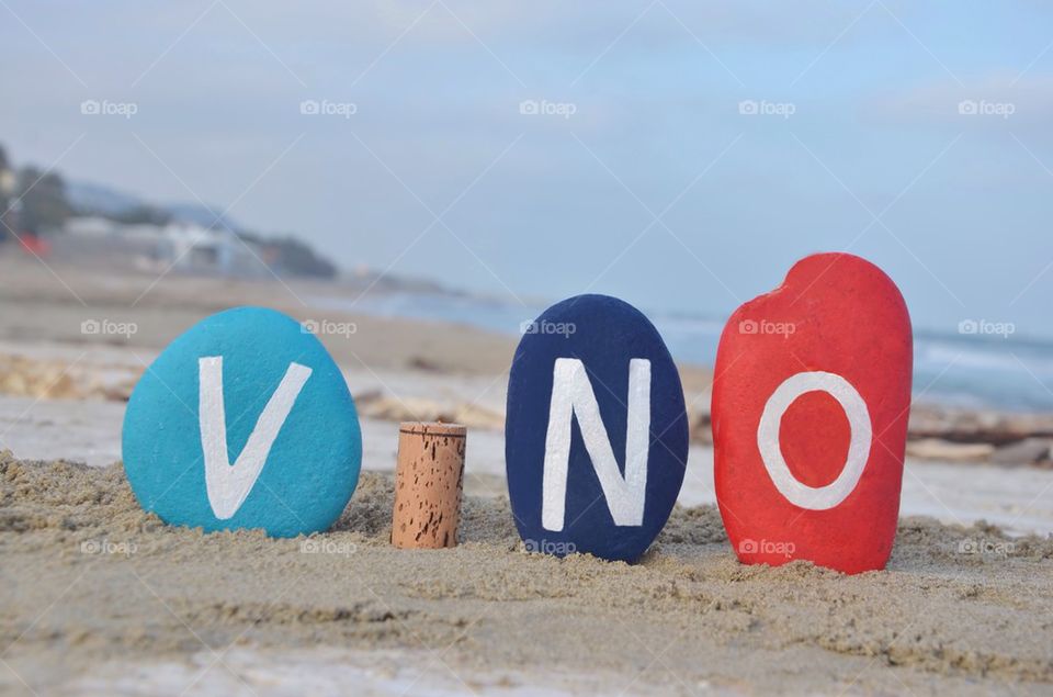 Vino, italian wine word on stones