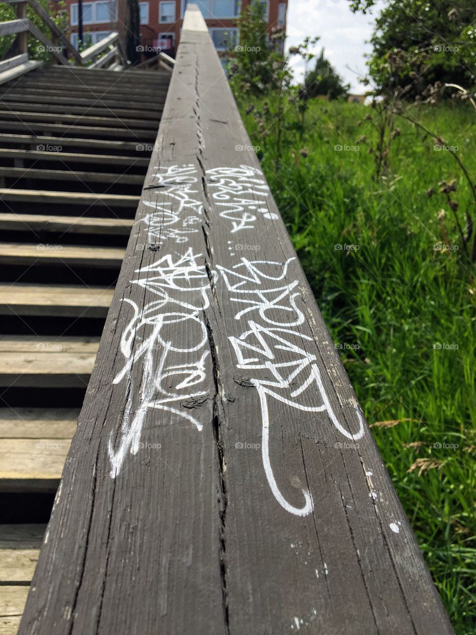 Graffiti on a wooden staircase 