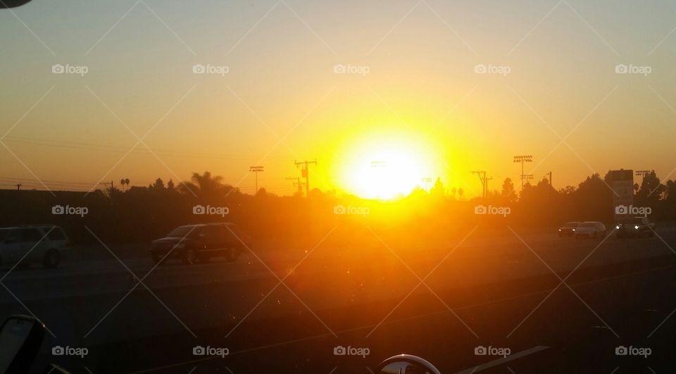 The sun on the I-10 in Garden Grove, California