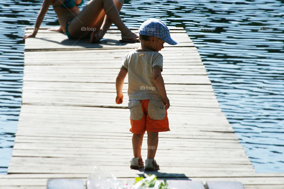 Boy on the lake