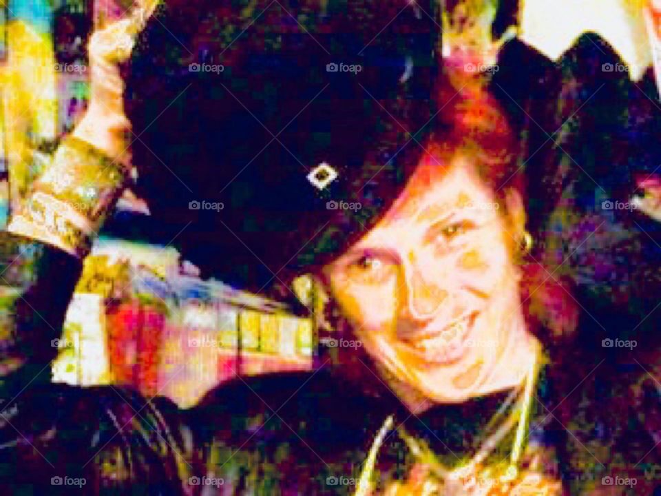 “Petra Schiller” tipping the stereotypical black hat I frequently still wear today. Photo was taken in my art studio in Manhattan in 2009. I am wearing a flaming “Hell’s Kitchen” T-Shirt that was also available for sale. Hypnotic Productions