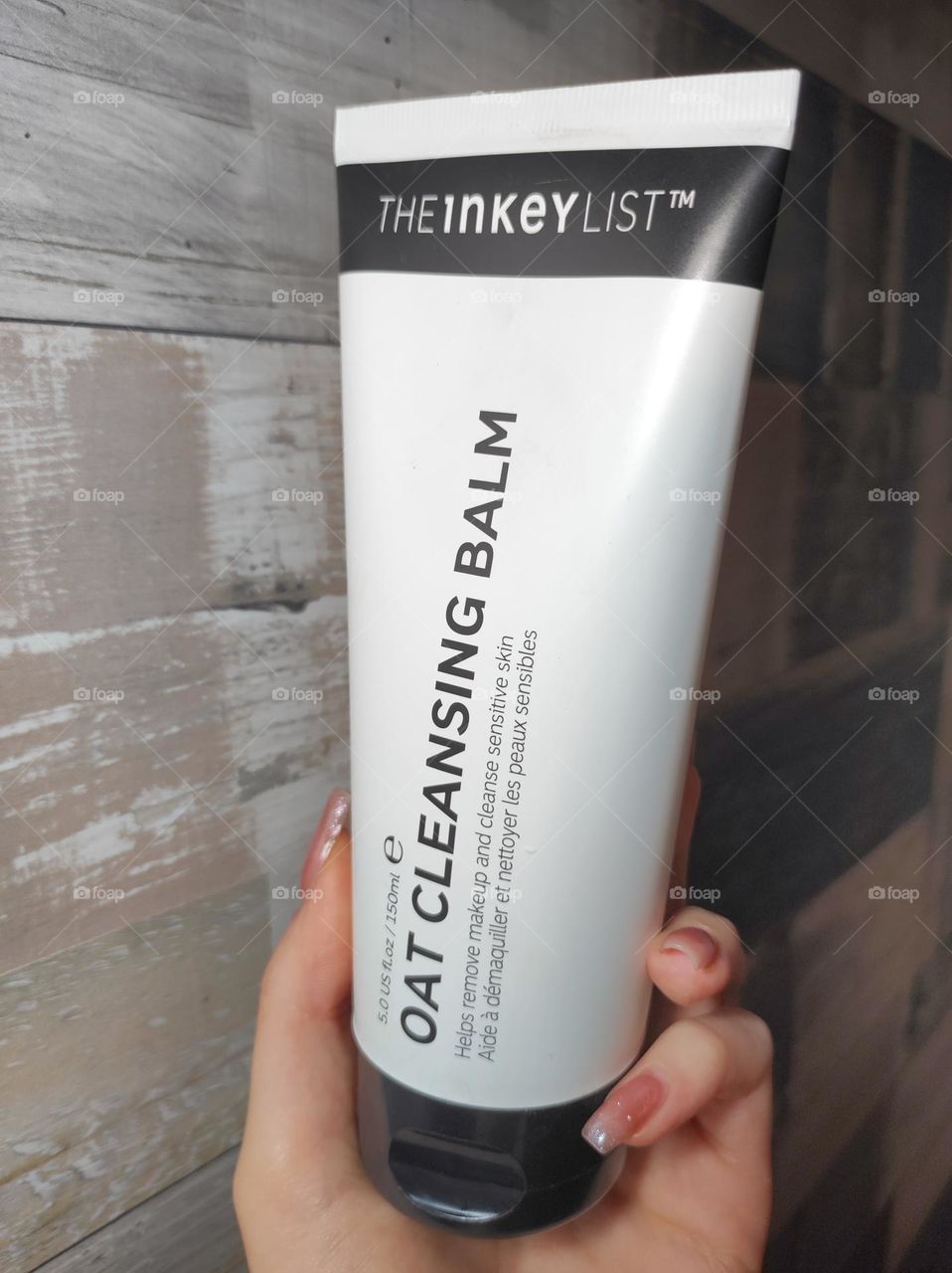 Beauty skincare product in hand/ Product photography /Skincare brands, packaging and serums/The Inkey List oat cleansing balm