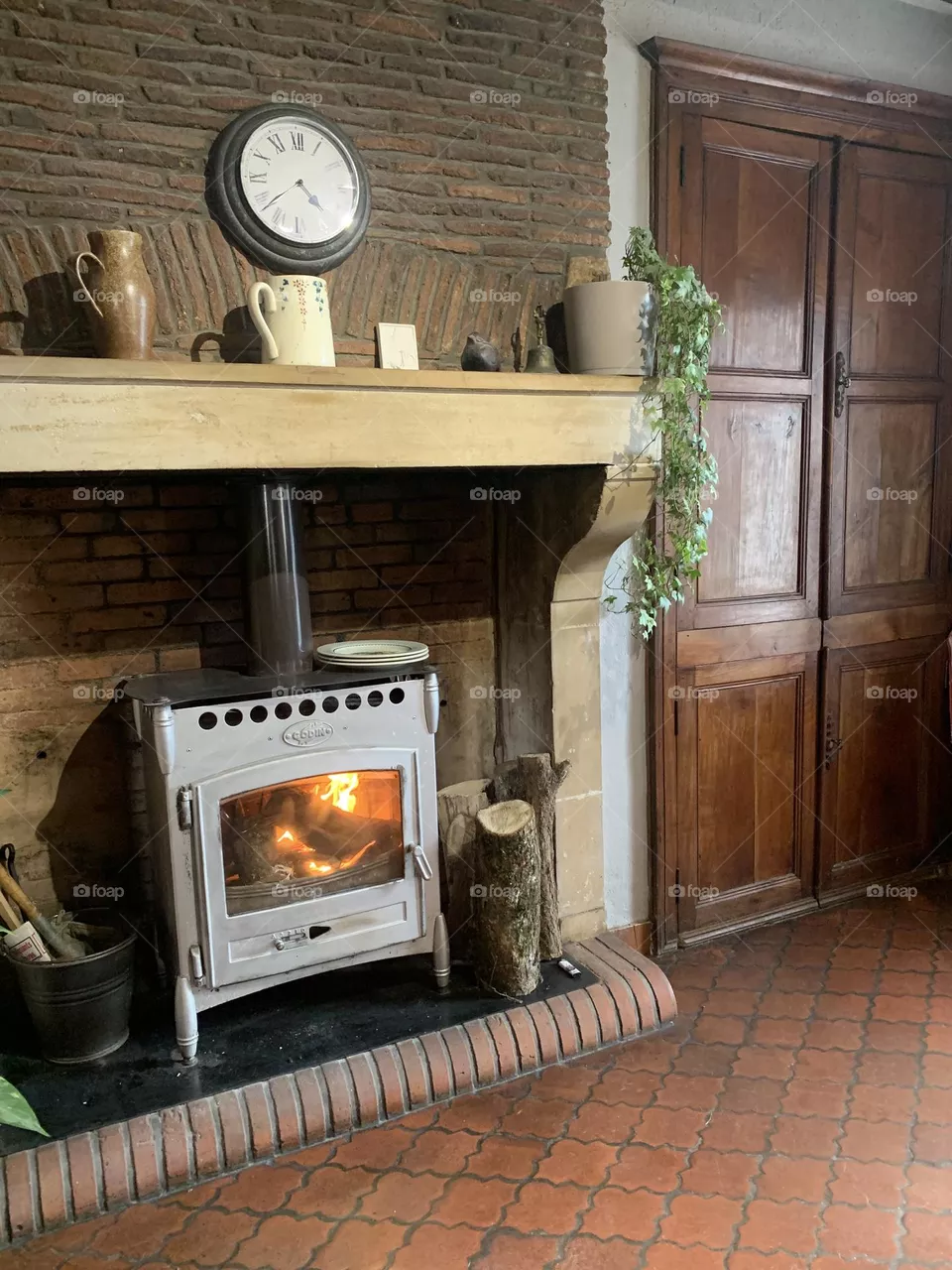 Rustic french house with its old and new fireplace 