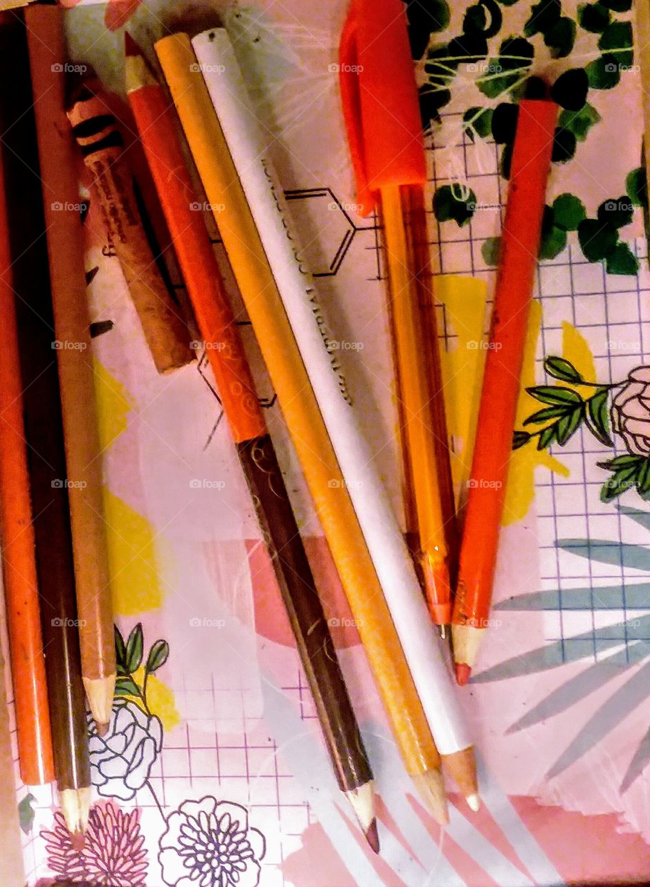 Orange Pencils and Pens