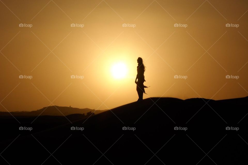 girl and the desert sunset