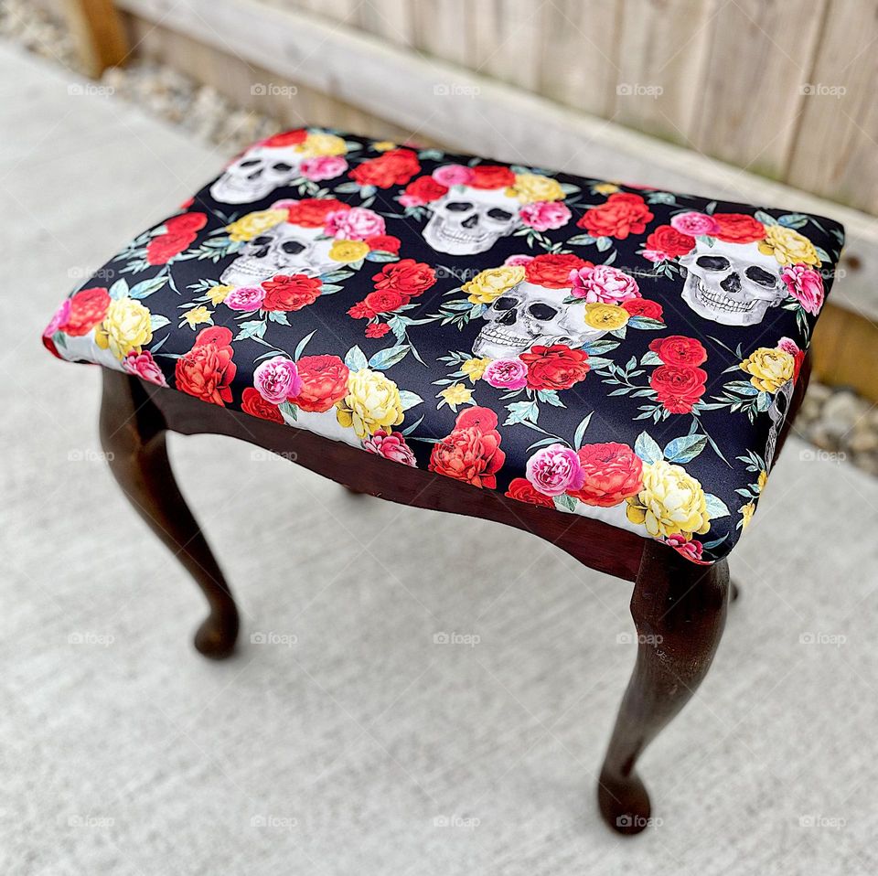 Skulls and roses patterned bench, reupholstered bench, reupholstering benches as a hobby, home furniture repairs, skulls and flowers, boho patterned material used for bench